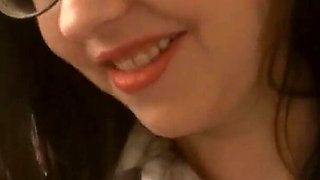 Tattooed brunette Audrey Alder mouth fucks big cock