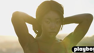 Petite black teenager model posed outdoor