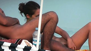 Nudist beach voyeur camera hunting for naked pussies