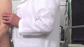 The freaky doctor measures temperature of naked woman in her anus