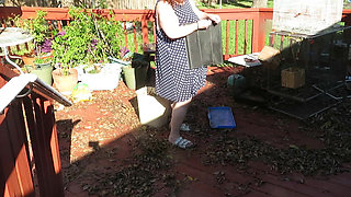 Playing in my garden showing off my tits belly ass, legs and fat pussy flashing you while cleaning up my leaves! red lace thong!