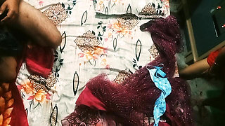 Beautiful Indian Bhabhi in Red Colour Saree.