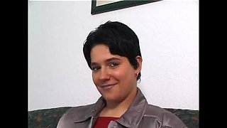 Chubby hairy brunette rubs her wet cunt during casting
