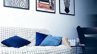 Cute amateur asian web cam girl playing with her toy