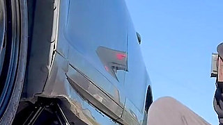 67 Tall Amazon Goddess Changes Her Tire - Big Feet in Frame