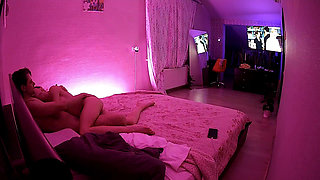 Kamila and Danildo cuddling in bed