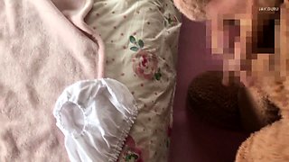 Pigtailed schoolgirl fucked by her furry friend on her bed
