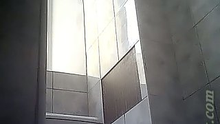 Really beautiful white booty of a young chick in the toilet