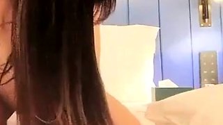 Small tit brunette amateur tugs on a big willie