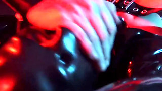 Girl in Latex lingerie and stockings masturbates with magic wand