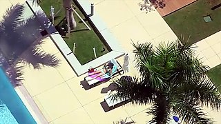 Cute girl in glasses by the pool picked up