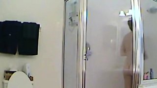 MILF stepmother spied in the shower