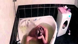 Peeking at stepdaughter Amy shaving in the bath