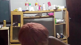 Black whore in black dress sucks tiny white cock at the hostel