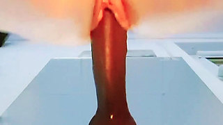 Riding BBC dildo on mirror