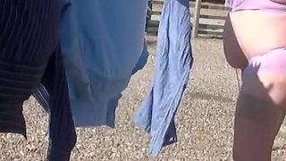Trisha hanging out the washing