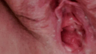 Pissing in close up with open pussy