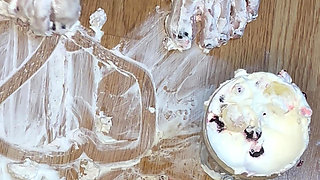 Playing with a whipped cream fruit bowl with my feet