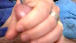 My wife gives me a gorgeous night handjob with a copious cum blast