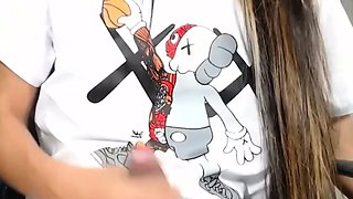 Young Tranny Shows Off Her Big Cock in an Explosive StripTan