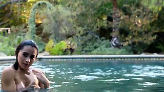 Big boobs Latina beauty strips swimsuit