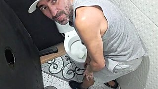 College Latina Student Finds Glory Hole in Bathroom & Gets a Blowjob Cumshot!