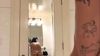 Busty Mia Khalifa cleans passionately with assets exposed