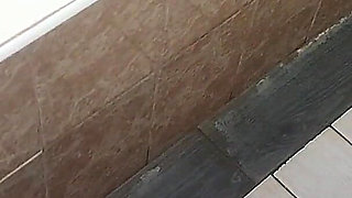 A Brunette Gets Pissed on