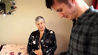 Lonely granny seduces young neighbor for wild fuck session