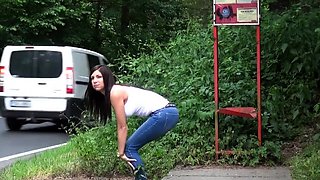 Smoking Babe Pees In Public At The Bus Stop