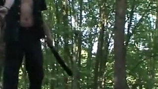 Humiliating whipping kneeling on the lake shore