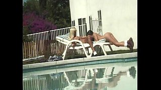 Hot lesbian model with tight asshole gets fingered on poolside